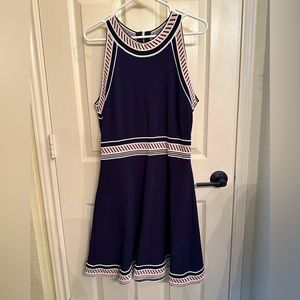 Short navy blue dress with white and pink trim design. Vince Camaro.